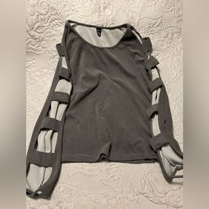 Long sleeve cut out blouse. Size XL but fits like a large in my opinion.